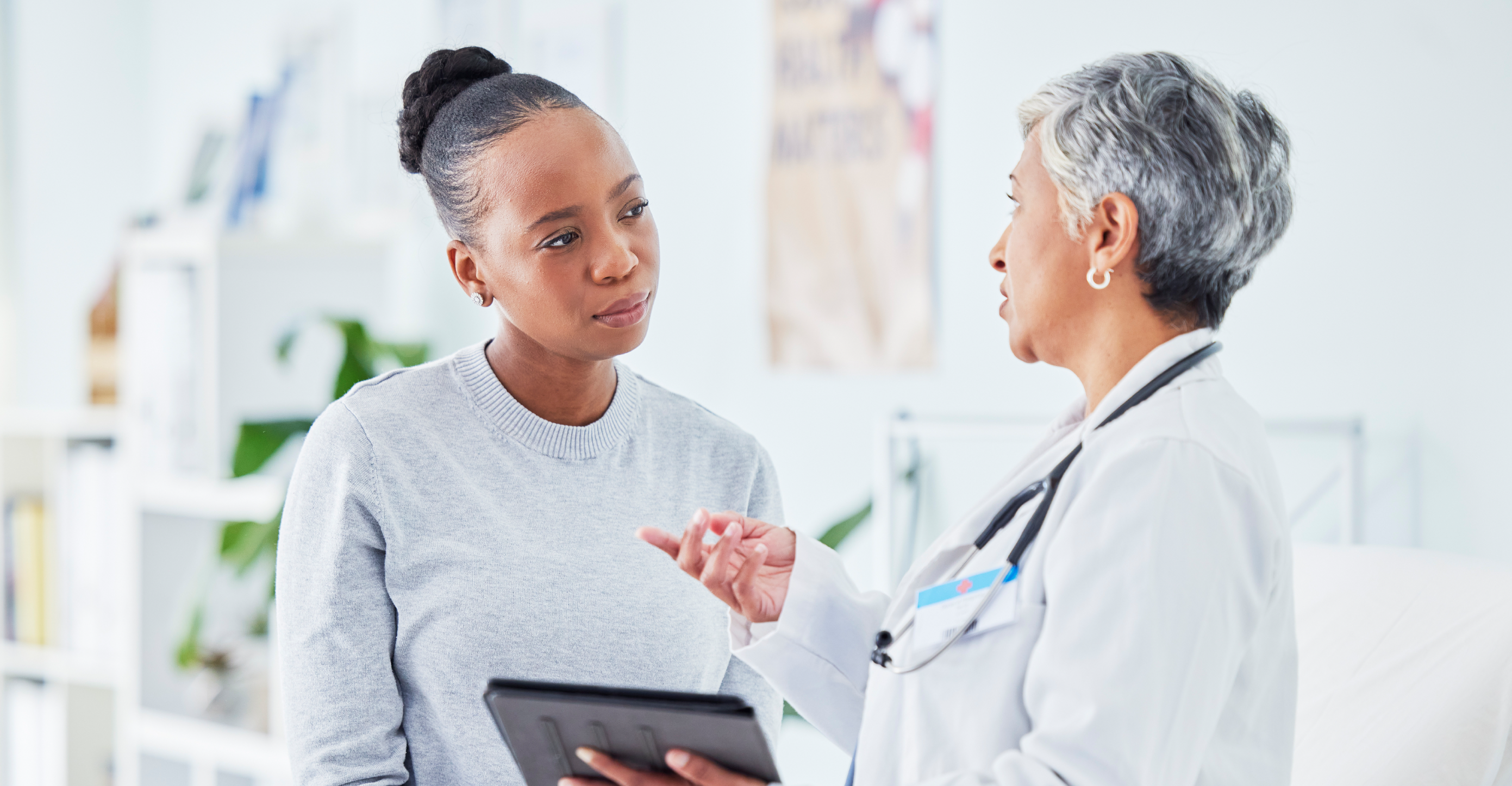 woman speaking to a medical provider 