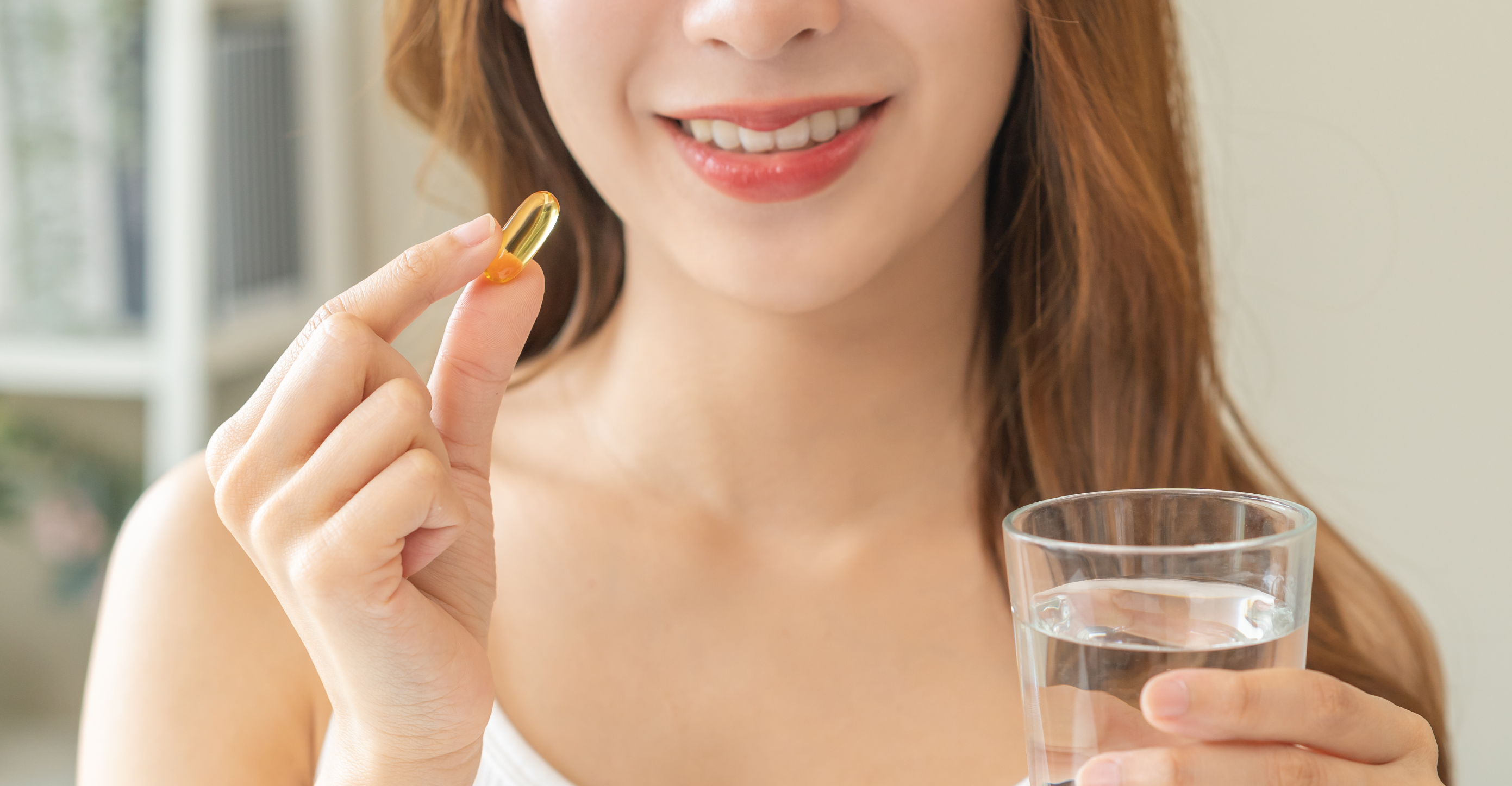 woman taking collagen supplements 