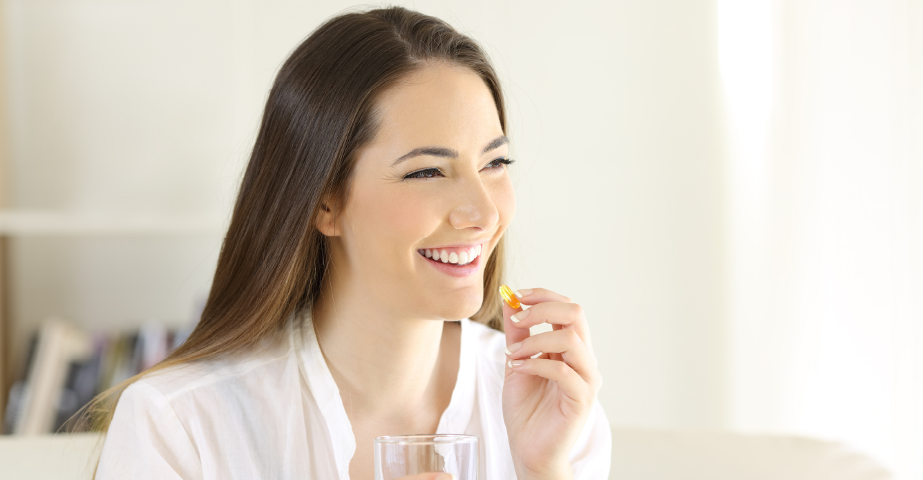 woman taking vitamins