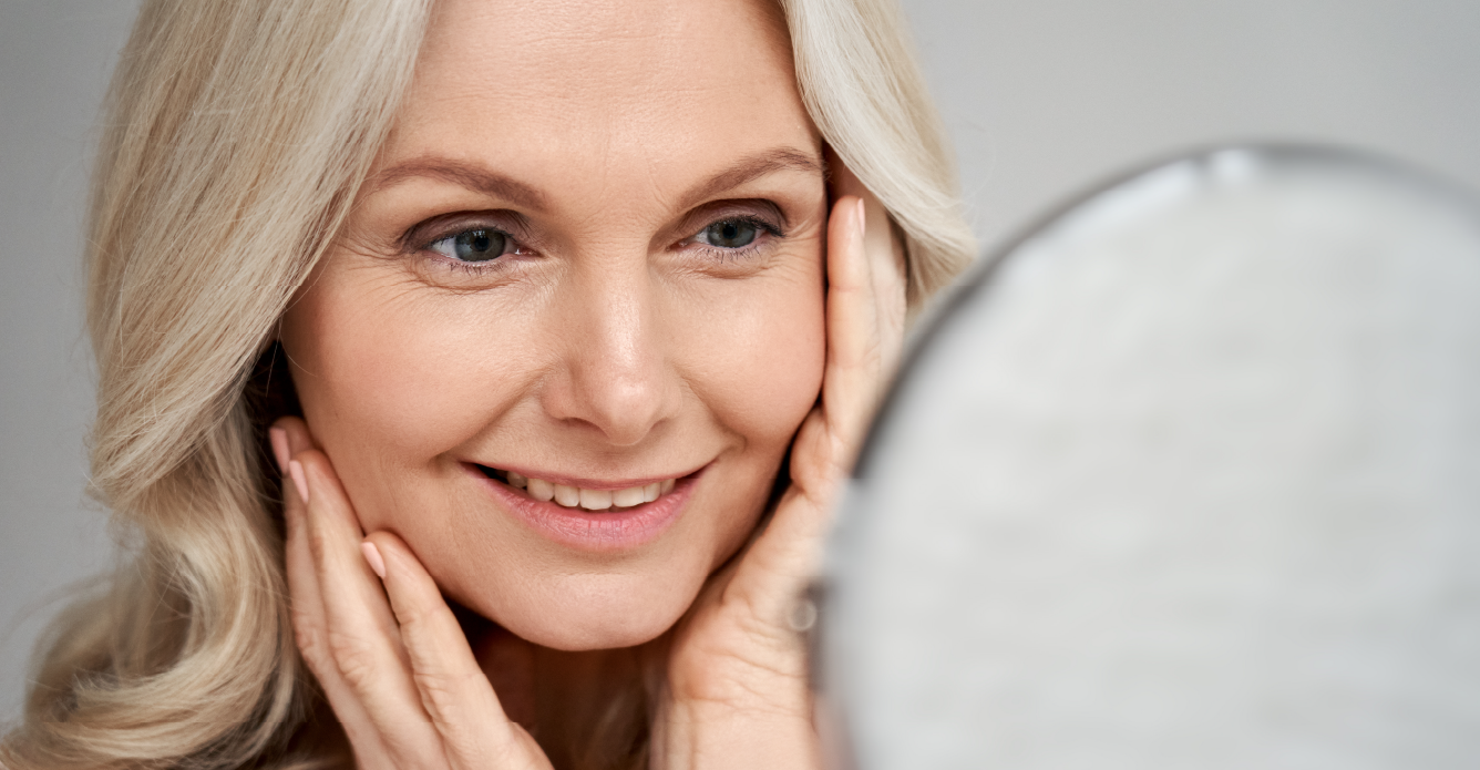 woman observing skin